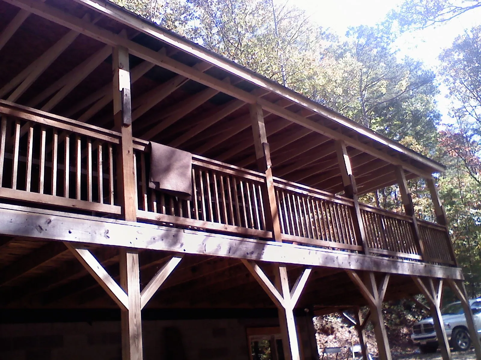 Timber framing under a new elevated porch and deck — Roof Leak Repair in Monterey Park by Roofing Brothers
